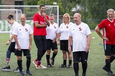 EMBARGOED TO 0001 TUESDAY JULY 29 EDITORIAL USE ONLY Former Liverpool F.C. player David James and Liverpool F.C. defender Gemma Bonner make a surprise appearance at a St Helens Walking Football Club friendly match, organised by Carlsberg as part of their initiative to demonstrate that it's never too late to follow your passions. Issue date: Tuesday July 29, 2025.