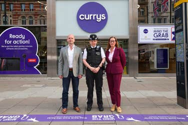 EDITORIAL USE ONLYEd Connolly, Chief Commercial Officer, Currys, Superintendent Natasha Evans, Metropolitan Police, Westminster, and Kate Johnston, Director, Crimestoppers, standing in front of a purple line installed outside Currys on Oxford Street in London as part of the retailer’s ‘Mind the Grab’ campaign, which aims to combat phone theft and introduce new in-store support for victims. Picture date: Wednesday August 6, 2025. PA Photo. The initiative follows new research commissioned by Currys revealing that most people view ‘phone snatching’ as a significant problem in the UK, prompting heightened concern about theft in the capital. The campaign aims to raise awareness and remind pedestrians to step back from the kerb and keep their phone hidden to reduce the risk of a snatch and grab theft.