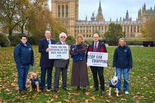 EDITORIAL USE ONLY (left to right) Ella Addison with Teddy a one year old Pocket Bully, Danny Chambers MP, Lord Trees, Neil Hudson MP and Libby Cannon with Zeiko a ten year old English Bull Terrier with Olivia Attwood (holding Battersea dog Buddy) Television personality and animal rights advocate join animal welfare charity, Battersea, outside the Houses of Parliament in London to celebrate ahead of the of Animal Welfare (Import of Dogs, Cats and Ferrets) Bill passing on November 21, which will ban the importation of dogs and cats with mutilations into the UK. Picture date: Thursday November 20, 2025.
