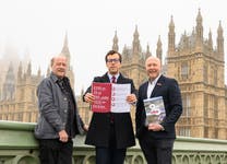 EMBARGOED TO 0001 THURSDAY MARCH 5 EDITORIAL USE ONLY (left to right) Sir Tim Smit, Co-founder of the Eden Project, Noah Law, Labour MP for St Austell and Newquay and Andy Jasper, CEO of the Eden Project deliver the landmark Eden Project 25-year Impact Report to the Houses of Parliament in London, outlining the charity’s contribution over the past 25 years, including £6.8 billion in economic activity generated since its opening in 2001. Issue date: Thursday March 5, 2026. PA Photo.