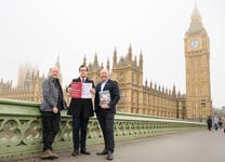 EMBARGOED TO 0001 THURSDAY MARCH 5 EDITORIAL USE ONLY (left to right) Sir Tim Smit, Co-founder of the Eden Project, Noah Law, Labour MP for St Austell and Newquay and Andy Jasper, CEO of the Eden Project deliver the landmark Eden Project 25-year Impact Report to the Houses of Parliament in London, outlining the charity’s contribution over the past 25 years, including £6.8 billion in economic activity generated since its opening in 2001. Issue date: Thursday March 5, 2026. PA Photo.