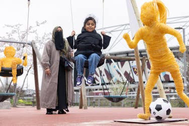 EDITORIAL USE ONLYYumna from London, age 6, who was diagnosed with neuroblastoma shortly after her 2nd birthday, with her mum Salma Bibi alongside replica chemotherapy‑wire sculptures installed at London’s Queen Elizabeth Olympic Park by Great Ormond Street Hospital Charity and created by Andy Goff to highlight the impact of rising childhood cancer diagnoses on families across the UK, as part of the charity’s mission to ensure every child has the best chance and best childhood possible. Picture date: Tuesday March 17, 2026. PA Photo.