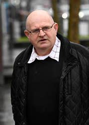 EDITORIAL USE ONLY Eel fisherman Declan Conlon arrives at court as campaigners gather outside the Royal Courts of Justice in Belfast in support of his judicial review against the Department of Agriculture, Environment and Rural Affairs (DAERA), challenging its management of agricultural pollution in Lough Neagh. Picture date: Tuesday March 24, 2026. PA Photo. The lake, the largest in the United Kingdom and Ireland and a source of nearly half of Northern Ireland’s drinking water, has experienced repeated blue-green algal blooms and ecological decline, reportedly visible from space.