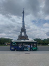 A bus in front of the Eiffel Tower