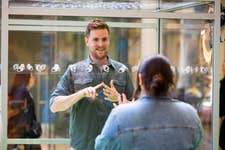 EDITORIAL USE ONLY Peter Martin-Jones stands inside a large transparent box installed by RNID (Royal National Institute for Deaf People) at St. Pancras International Station in London to mark Deaf Awareness Week, designed to highlight the communication challenges faced by deaf people and those with hearing loss. Picture date: Wednesday May 6, 2026. PA Photo. The installation invites members of the public to step inside the box to better understand communication barriers, following research showing that almost a quarter of people would avoid conversations with someone who is deaf or has hearing loss if they think it would be difficult to communicate.