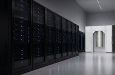 IQM Radiance quantum computer (right) co-located with classical HPC infrastructure (left) in a data center environment.
