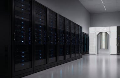 IQM Radiance quantum computer (right) co-located with classical HPC infrastructure (left) in a data center environment.