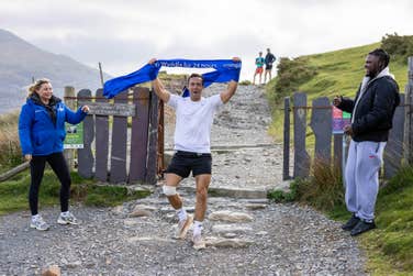 EDITORIAL USE ONLY Spencer Matthews (centre) arrives at base camp following an endurance challenge with O2 Satellite, completing a 92km route across Mount Snowdon in Wales through repeated ascents and descents within 24 hours. Picture date: Friday May 22, 2026. PA Photo. The challenge used O2’s new satellite connectivity service, providing coverage across remote sections of the mountain where traditional mobile signal can drop out.