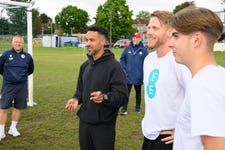 EDITORIAL USE ONLY Former England footballer Theo Walcott joins Teviot Rangers JFC alongside Josh Paul and Rhys 19, for a training session in London as part of EE's new 'Yes Boys' campaign exploring the impact of negative online influences on boys' attitudes and behaviour. Picture date: Tuesday June 2, 2026. PA Photo. The campaign follows research from EE showing that almost half of boys aged 11 to 16 are exposed to harmful stereotypes about masculinity multiple times a week, while nearly two-thirds of parents believe football has a positive impact on their son's confidence and identity.