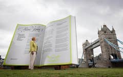 EDITORIAL USE ONLY Selina Vickers, ancestor of Dr Annie Wainwright Hyatt, views the ‘Missing Pages’ installation, unveiled by Ancestry in London to launch ‘The Parity Principle’, a new framework aimed at ensuring women from the past are recognised and celebrated for their contributions to society. Picture date: Wednesday June 3, 2026. PA Photo. The activation highlights new Ancestry research revealing that men are mentioned more than four times as often as women in UK Key Stage 3 history textbooks, while more than half of the public admit they are more confident naming male historical figures than female ones.