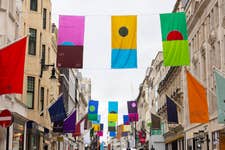 EDITORIAL USE ONLY General view of the newly unveiled series of 27 flags created by artist Ugo Rondinone along Bond Street in London as part of the ninth edition of the annual Art in Mayfair, curated by the New West End Company in partnership with the Royal Academy of Arts during the 258th Summer Exhibition. Picture date: Monday June 8, 2026. PA Photo. The flags are based on the artist’s signature ‘sunrisesunset’ watercolour paintings and will adorn the street from today until mid-August.