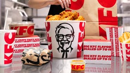 KFC’s updated visual identity extends across packaging – turning bags, cups, boxes and its iconic bucket into bold branded touchpoints.