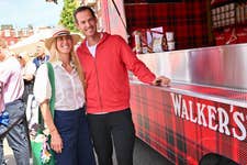 EDITORIAL USE ONLY Adriana Chryssicopoulos meets Sir Andy Murray during The 2026 HSBC Championships at the Queen’s Club in London in partnership with Walker’s Shortbread, stepping inside the brand's experiential 'Walker's Shortbread Dome’, to take part in a timed reflex challenge. Picture date: Tuesday June 16, 2026. PA Photo. The initiative marks Walker’s Shortbread’s debut as an official supporter of the 2026 HSBC Championships.