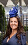 EDITORIAL USE ONLY Debbie Goolding, National Lottery winner, wearing a bespoke crossed fingers hat to Royal Ascot Ladies Day inspired by her win. Picture date: Thursday June 18, 2026. PA Photo. Designed and handcrafted by milliner Barnaby Horn, the headpiece is designed to reflect Debbie’s personal journey of hope, optimism and possibility, which led to her £1 million win.