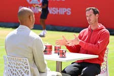EDITORIAL USE ONLY Sir Andy Murray (right) talks with Ross Lafayette during his visit to The 2026 HSBC Championships at the Queen’s Club in London with Walker’s Shortbread, meeting fans in his role as the brand’s ‘Spectator Coach’. Issue date: Monday June 22, 2026. PA Photo. The initiative marks Walker’s Shortbread’s debut as an official supporter of the 2026 HSBC Championships.
