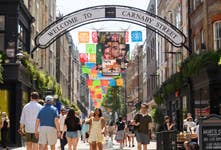 EDITORIAL USE ONLYGeneral view of Carnaby Street in London, where the newly unveiled ‘¡Frida Icónica!’, a public art installation featuring papel picado banners and a large-scale mural inspired by the life and work of Frida Kahlo, has launched in collaboration with Tate Modern ahead of today’s opening of the exhibition ‘Frida: The Making of an Icon’. Picture date: Thursday June 25, 2026. PA Photo.