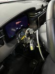 The actuator in the picture is a specifically developed steer actuator featuring a direct drive motor and custom integration. The actuator is capable of providing the required steering torque to safely drive the car at the limit. The system allows to drive the car manually when disengaged with no external resistance.
