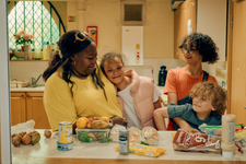 Sammie and her grandchildren making a picnic together, using food from their 'Holiday Bites' bags in Tameside, Greater Manchester. Holiday Bites is an initiative to ensure families have food during the summer break led by The Children's Community, Tameside and supported by Save the Children.