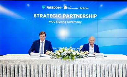 From left to right: Timur Turlov, CEO of Freedom Holding Corp., Leiming Chen, Senior Vice President and Chief Sustainability Officer of Ant International