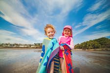 Bluestone National Park Resort's summer programme, A Summer of Salt and Soil, which encourages child-led exploration, outdoor adventure and family connection in the heart of the Pembrokeshire Coast National Park.